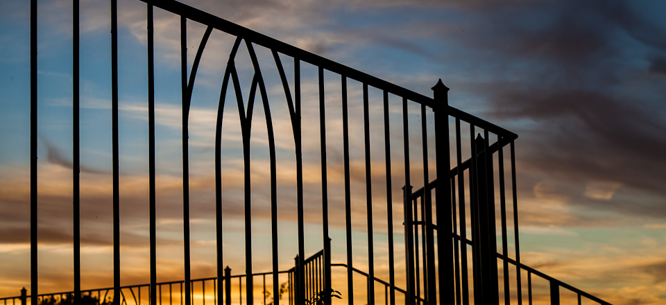 U Sunset through Railings North Norfolk2